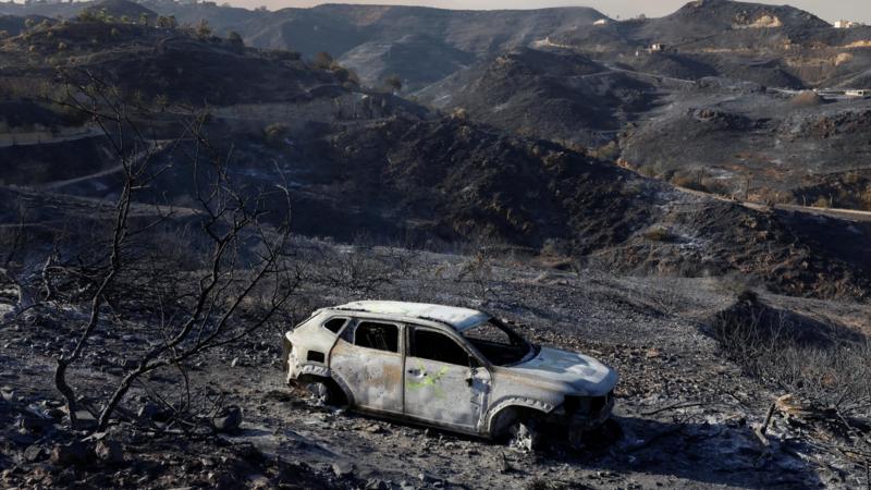 Aerial view of a wildfire burning through hillside terrain in Almeria, Spain