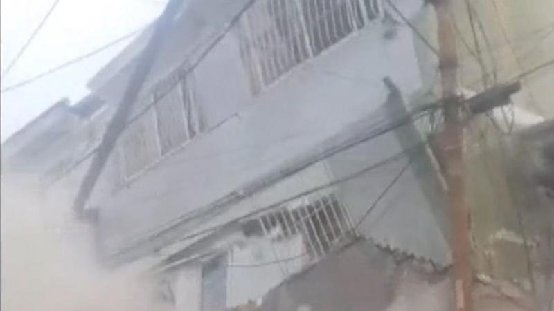 Chaos after building collapses on Caracas outskirts