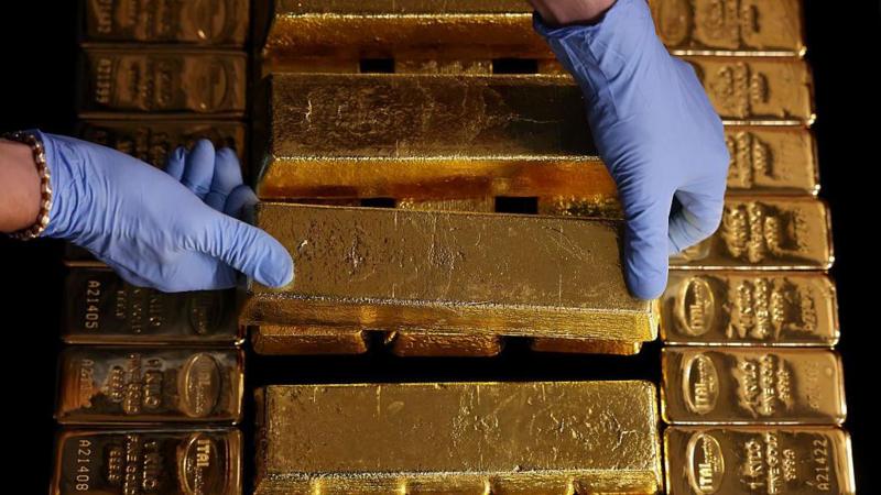 Gold hits record $4,000 an ounce as uncertainty fuels rally