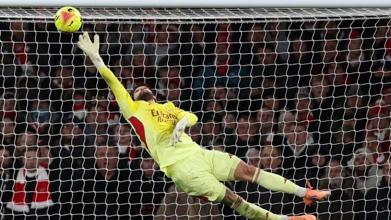 Arsenal in 'survival' mode as 'sensational' Raya save keeps them top