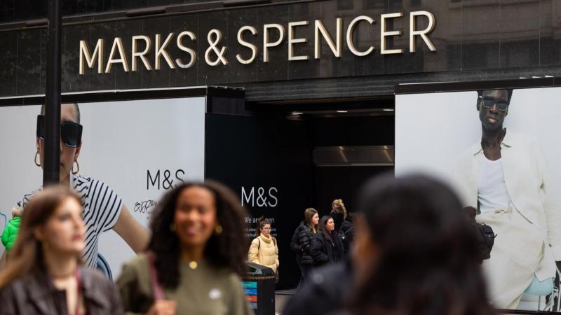 M&S profits halved after cyber attack