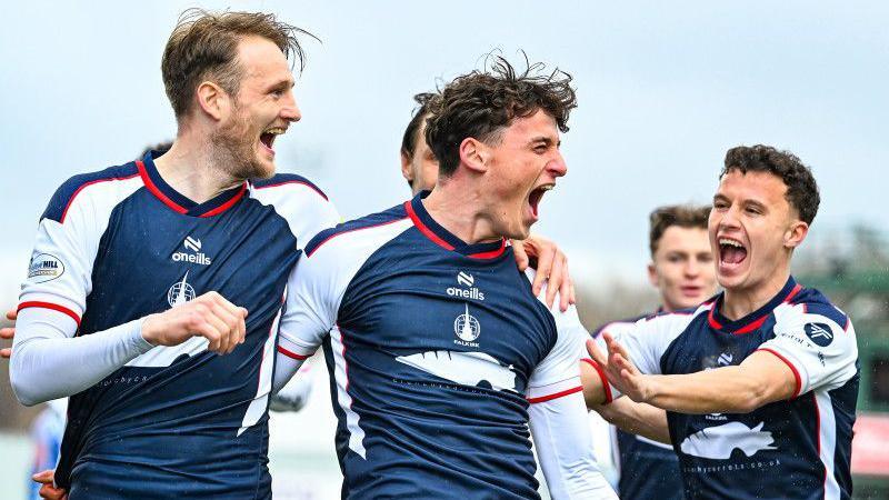 Falkirk's Barney Stewart (centre) celebrates a goal