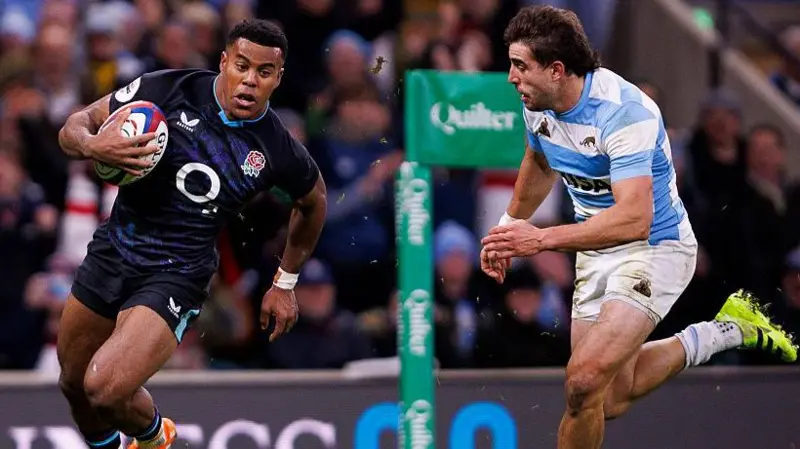 England winger Immanuel Feyi-Waboso scores his side's second try in the win against Argentina at Twickenham in November