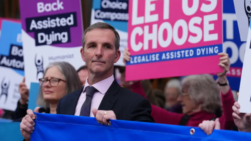 Liam McArthur with campaigners outside Holyrood