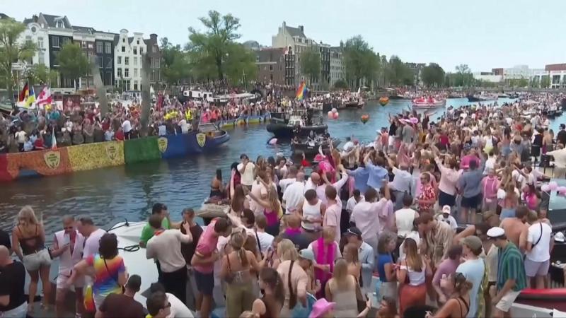 Crowds line Amsterdam's canals for Pride boat parade