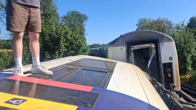 People were stood on top of the tipped over carriages after the derailment