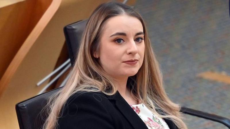 Meghan Gallacher sitting in the Holyrood chamber