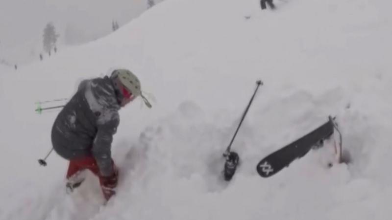 Watch dramatic rescue of skier buried in deep snow