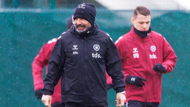 Hearts boss Derek McInnes oversees a chilly training session