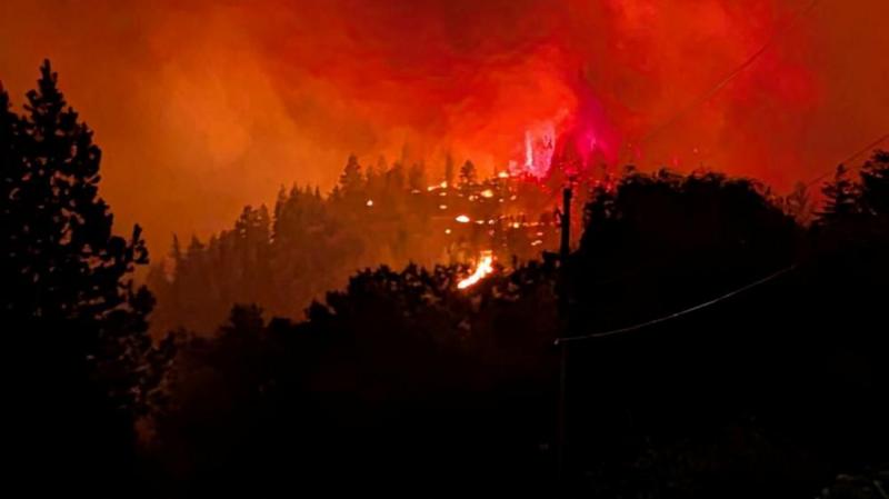 Fast-moving Canada wildfire doubles in size forcing thousands to flee homes
