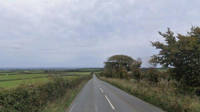 Helicopter crashes into field in Devon