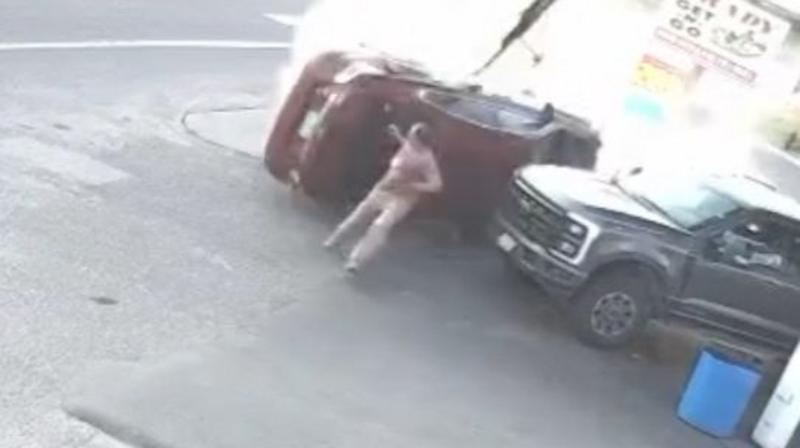 Moment man narrowly avoids being hit by car in petrol station crash