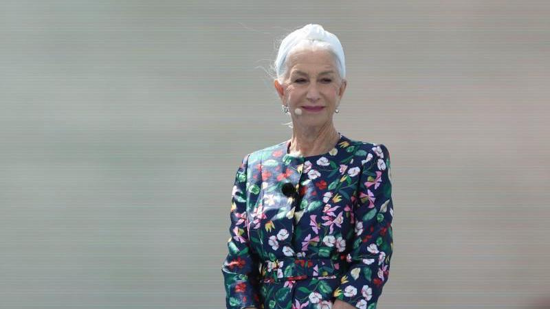 Dame Helen Mirren in a flowery dress