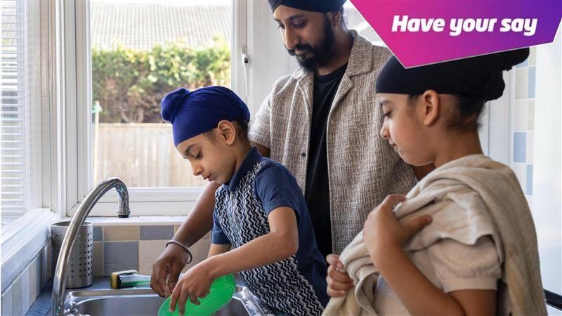 A family doing the washing up.