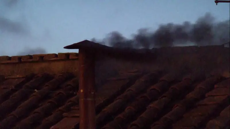 Black smoke seen from Sistine Chapel as cardinals fail to elect new pope on day one of the conclave