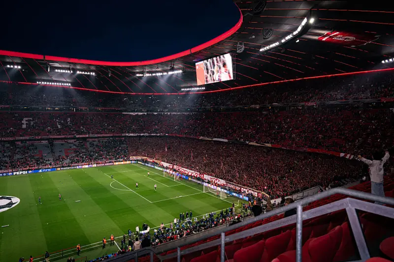 Arsenal fans atmosphere Emirates Stadium Champions League night crowd London