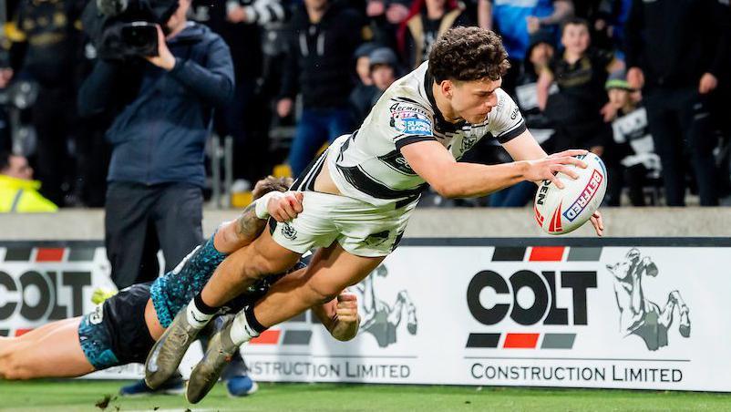 Hull FC winger Lewis Martin scores a try against Leigh Leopards