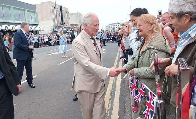 King Charles shaking hands with crowds of well wishes in during his visit to Morecambe in 2022 when he was the Prince of Wales.