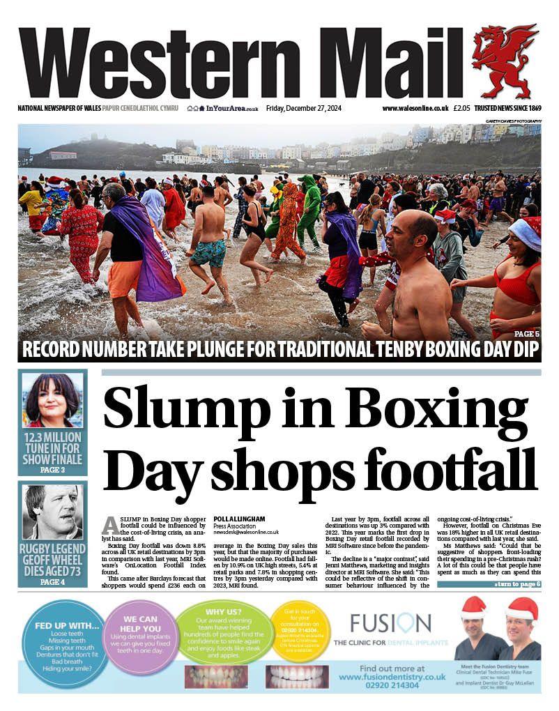 Western Mail front page: Slump in Boxing day shops footfall. story 2: record number take plunge for traditional Tenby Boxing Day dip .