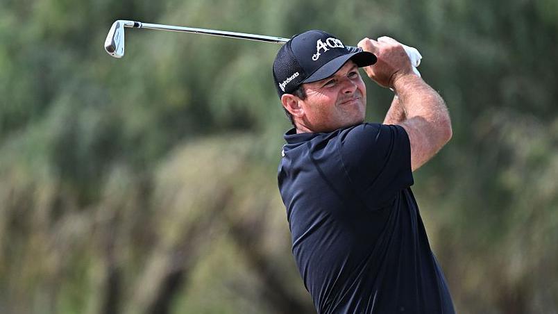 Patrick Reed playing an iron shot