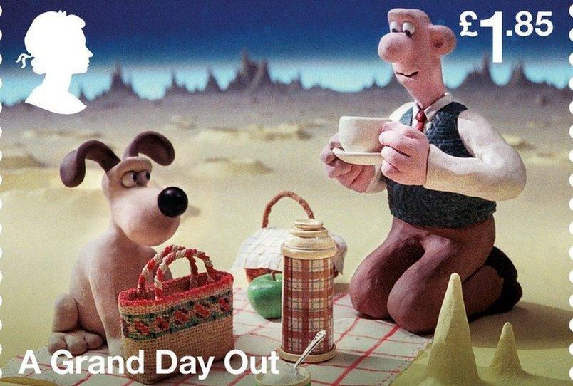 Wallace and Gromit having a picnic on a beach