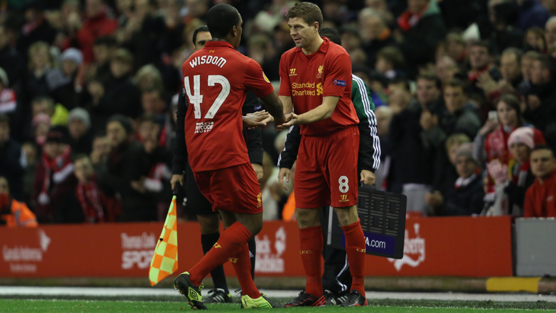 Liverpool's Andre Wisdom is replaced by Steven Gerrard in a Europa League tie at Anfield in 2012 