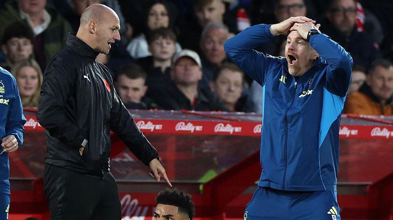 Nottingham Forest head coach Sean Dyche complains to fourth official Bobby Madley during his side's 2-2 draw with Manchester United.