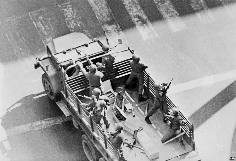 Chilean soldiers patrol the streets of the capital city