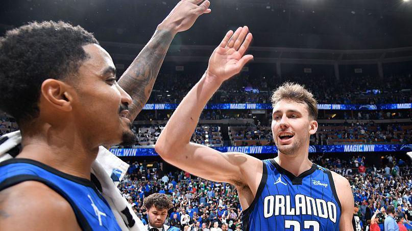 Gary Harris high-fives Franz Wagner after the Orlando Magic win game three of their 2025 play-off series with the Boston Celtics