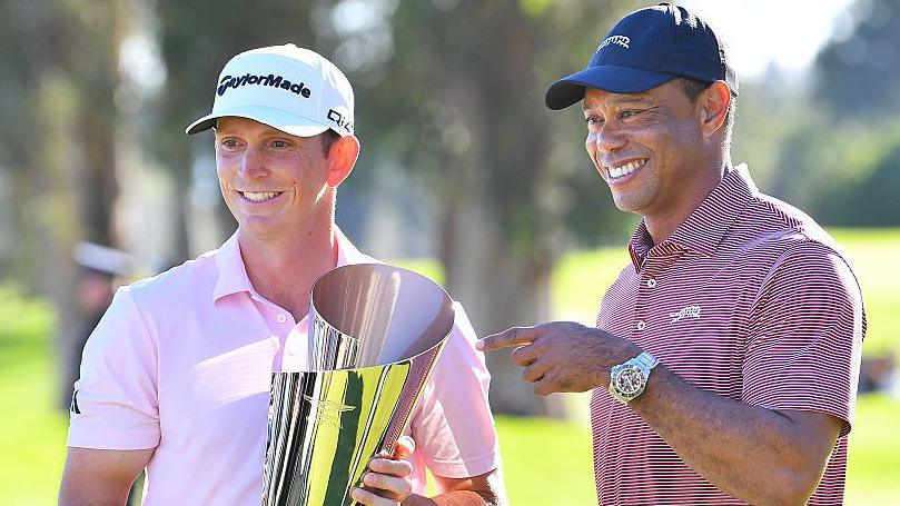 Jacob Bridgeman and Tiger Woods