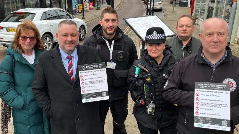 Melanie Coleman, Jason Smithers, Will Boulter, a police woman, Paul Wilcox and Stephen Mold in Rushden High Street