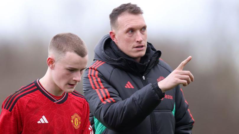 Phil Jones with Ashton Missin during his time coaching Manchester United's Under-18 team in the 2023-24 season.