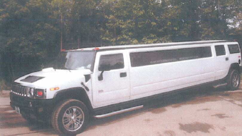 A white Hummer stretch limousine