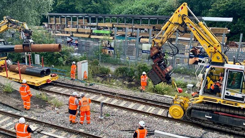 Workers repairing a railway track