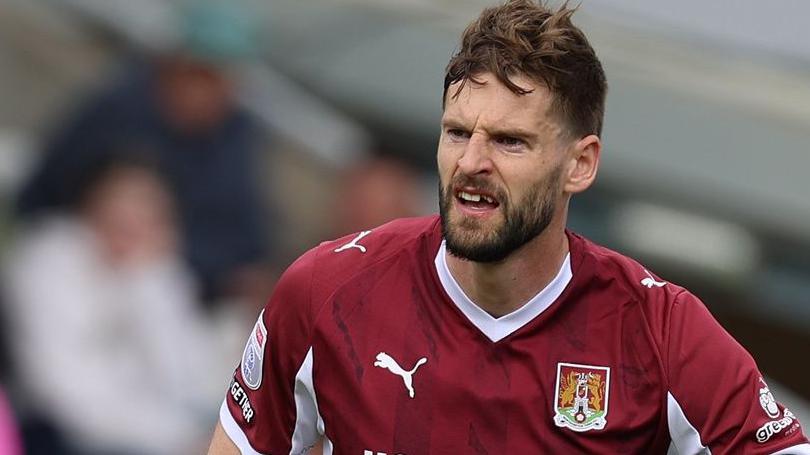 Jon Guthrie in action for Northampton Town