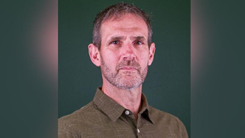Ivan Dabbs wearing a shirt in his official West Northamptonshire council photograph