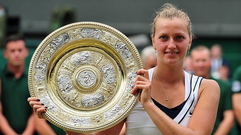 Petra Kvitova holds the Wimbledon trophy in 2011