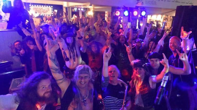 The Dolmen and their audience posing for the camera at their gig in Hardy's Hophouse pub