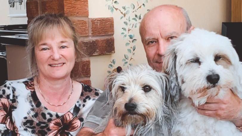 Nikki Stephens with her husband Gary and two dogs