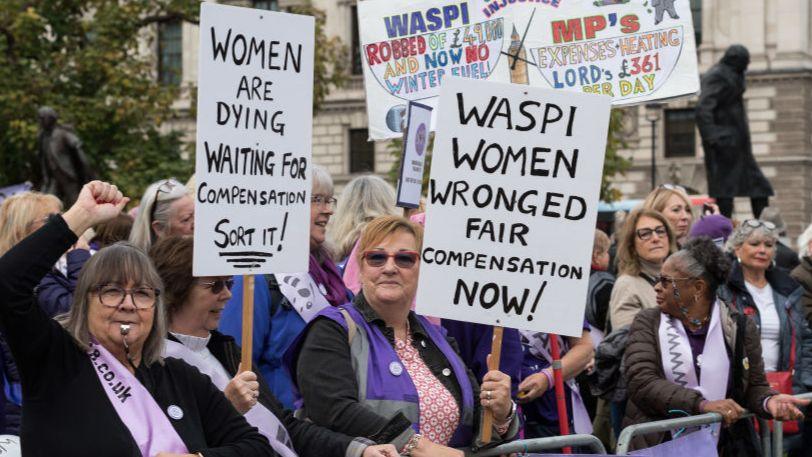 Waspi women with placards 