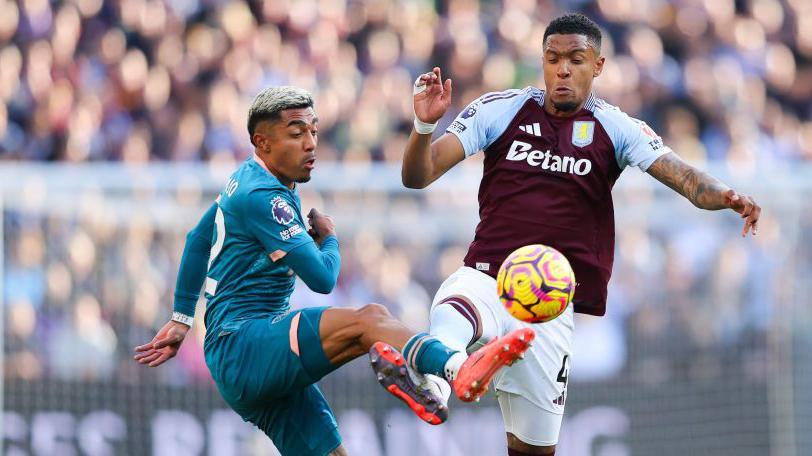 Julian Araujo of AFC Bournemouth battles for possession with Ezri Konsa of Aston Villa during the Premier League match between Aston Villa FC and AFC Bournemouth at Villa Park