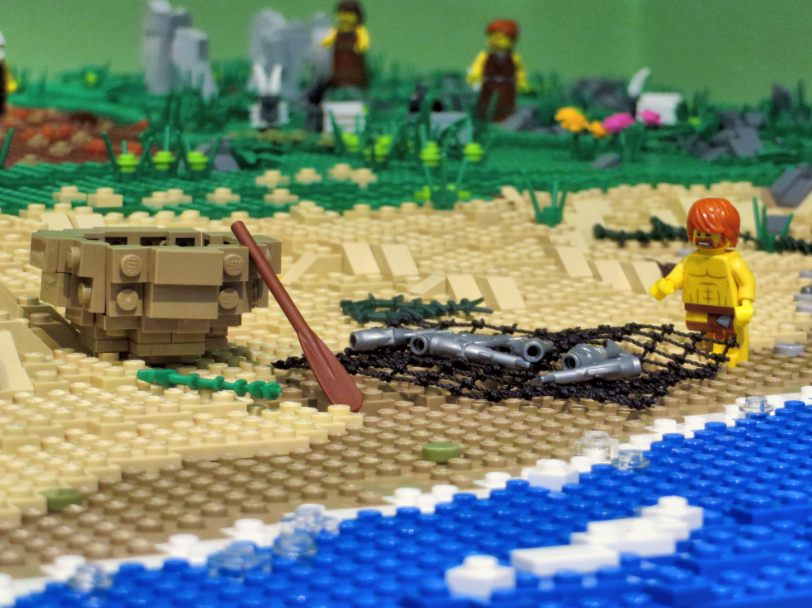 Lego mini figure and coracle