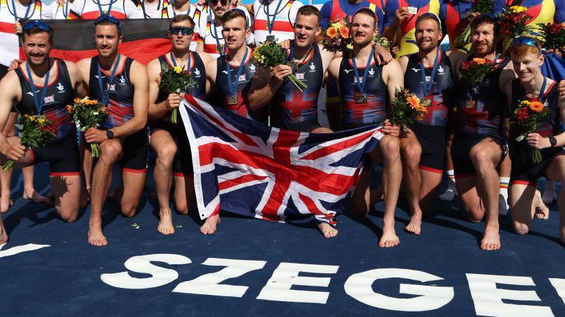 SZEGED, HUNGARY - APRIL 27: Sholto Carnegie, Rory Gibbs, Morgan Bolding, Jacob Dawson, Charles Elwes, Thomas Digby, James Rudkin, Tom Ford, Harry Brightmore of Great Britain celebrate the gold medal after the Men's Eight Final race during the European Rowing Championships 2024 at National Canoeing and Rowing Olympic Center on April 27, 2024 in Szeged, Hungary.