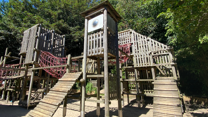 Wooden towers, ladders and equipment in the Coastal Park play area.