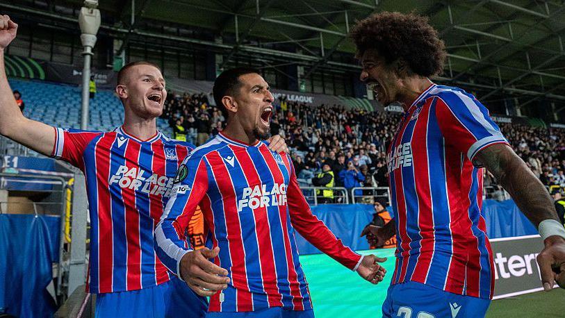 Daniel Munoz of Crystal Palace celebrates with Adam Wharton and Chris Richards