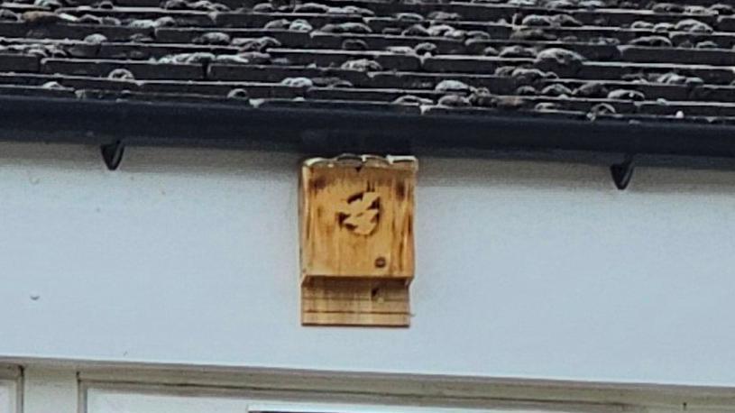 A bat box on a house