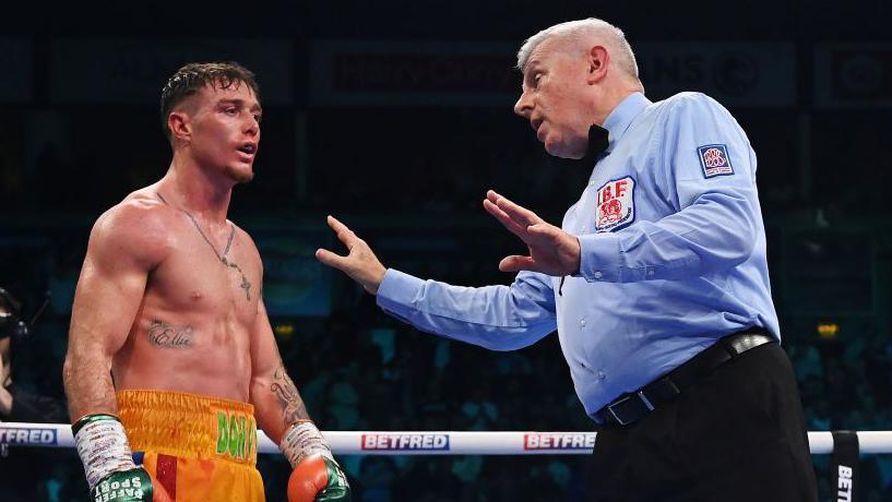 Referee Marcus McDonnell disqualified Donovan at the end of the eighth round