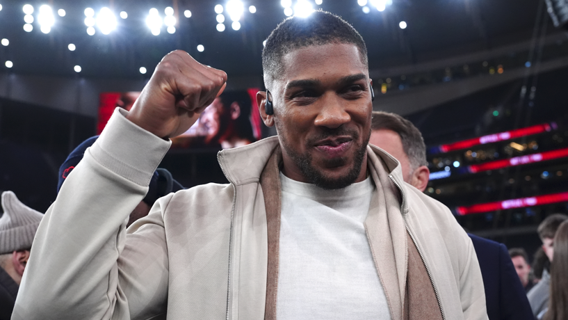 Anthony Joshua puts his fist up