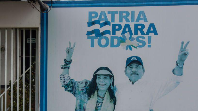 iew of a billboard with the picture of Nicaraguan President Daniel Ortega (R) and Vice-President Rosario Murillo at the entrance of a government office at Carretera Masaya on June 27, 2021 in Managua, Nicaragua. The billboard reads "Patria para todos" (Spanish for: "Fatherland for all").