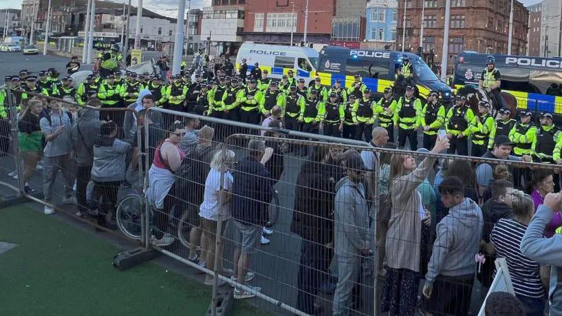 Large numbers of police and protesters in Blackpool